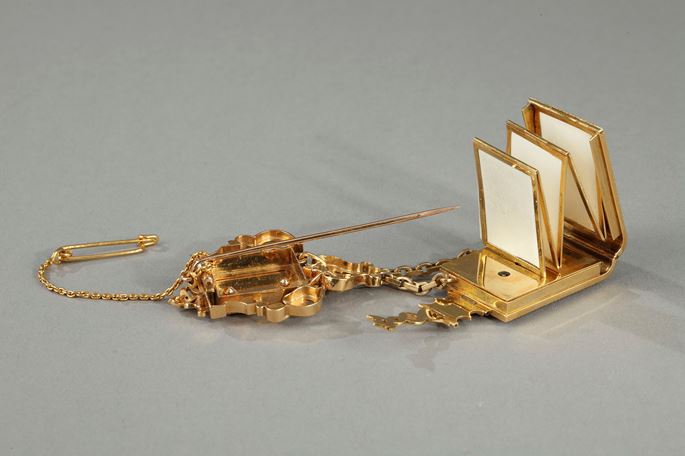 A gold and enamel watch with associated chatelaine. | MasterArt